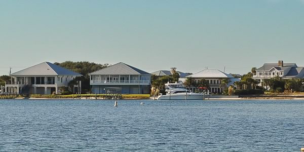 three bayou waterfront homes